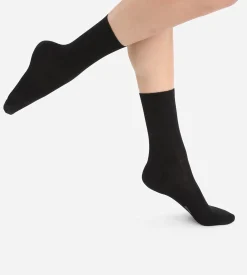 Chaussettes unies noires en laine douce Femme