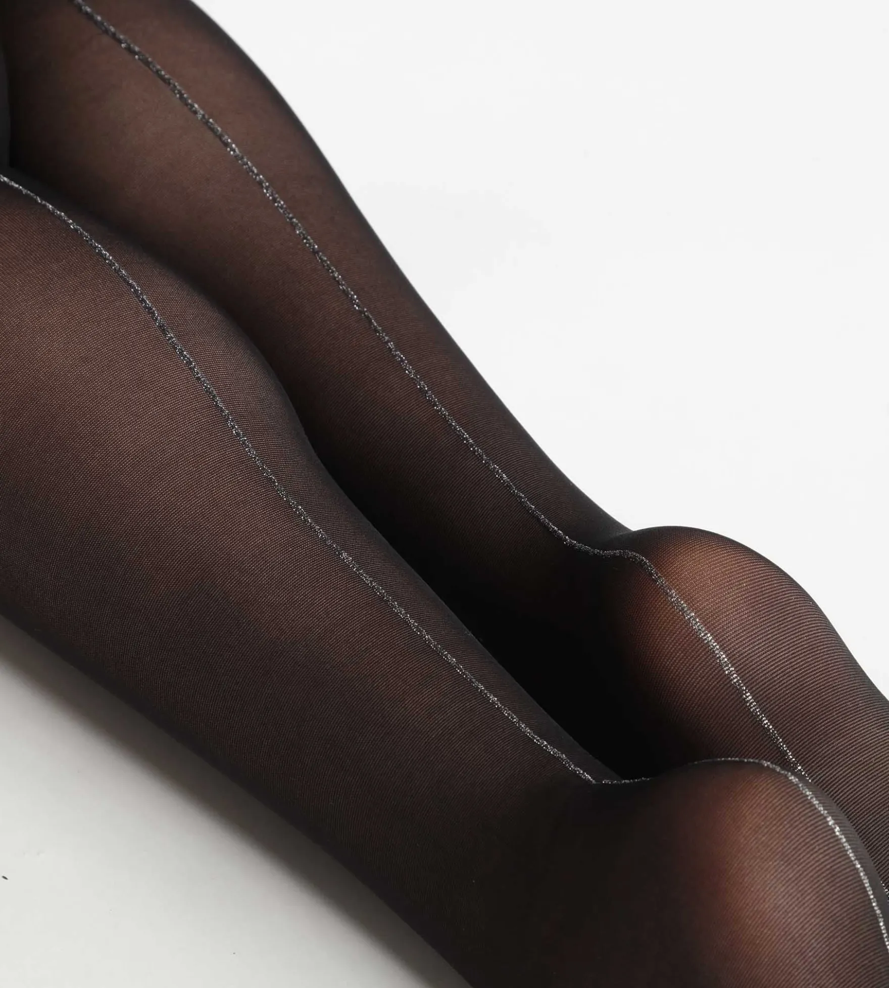 Collant transparent Noir avec bande de lurex argenté Dim Style